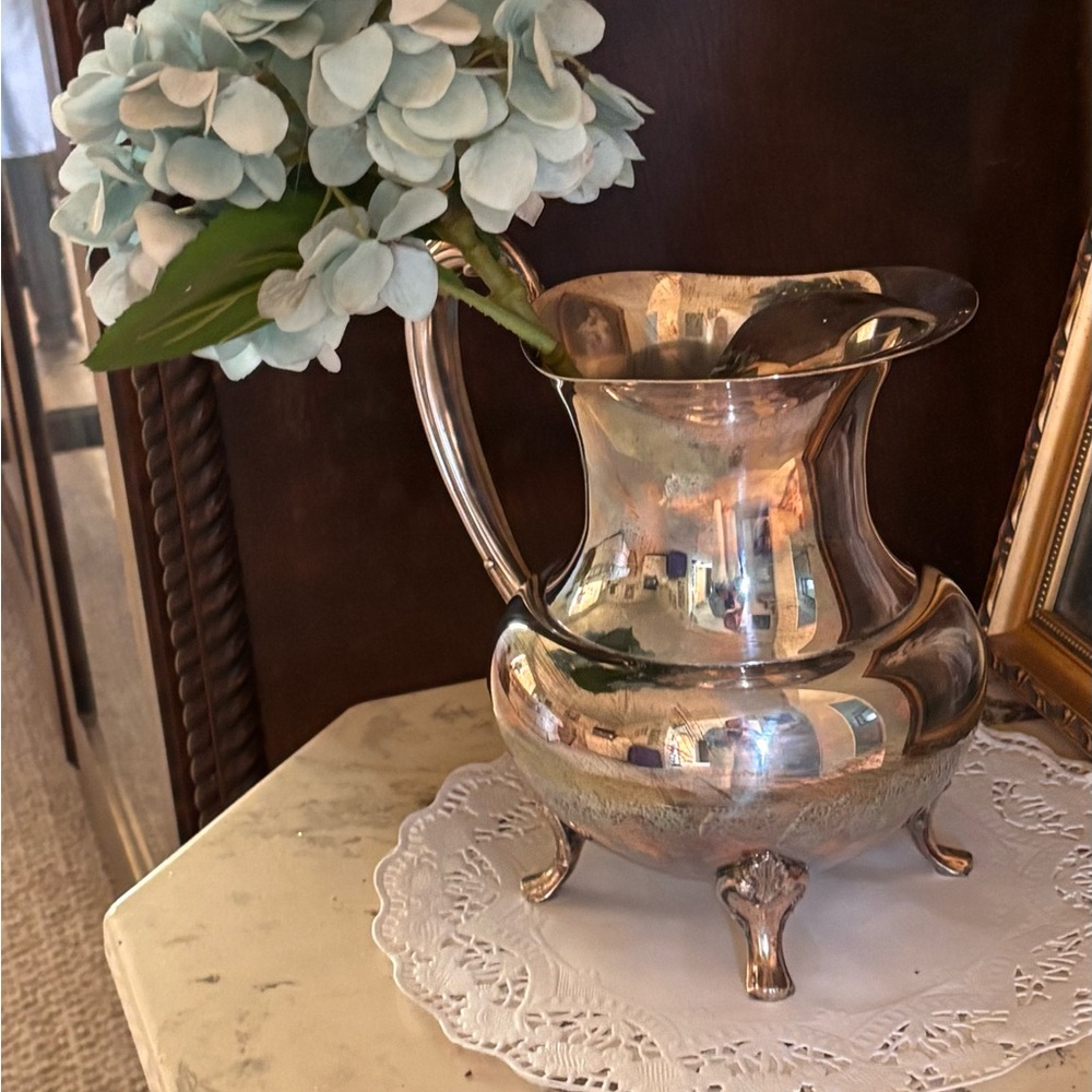 Vintage Oneida silver plated water pitcher.